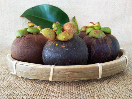 the mangosteens in the basket