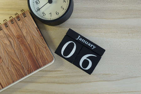 cube calendar on the wooden backgroundの写真素材
