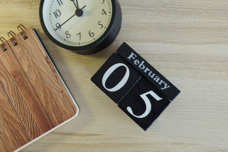 cube calendar on the wooden backgroundの写真素材