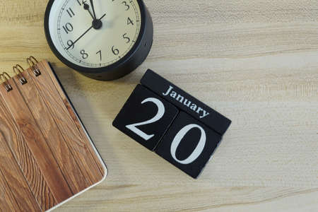 cube calendar on the wooden backgroundの写真素材