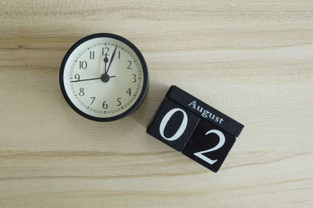 cube calendar on the wooden backgroundの写真素材