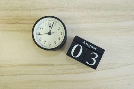 cube calendar on the wooden backgroundの写真素材