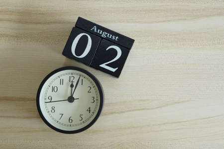 cube calendar on the wooden backgroundの写真素材