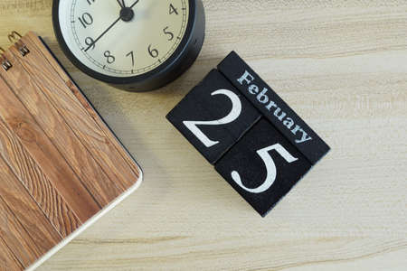 cube calendar on the wooden backgroundの写真素材