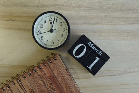 cube calendar on the wooden backgroundの写真素材