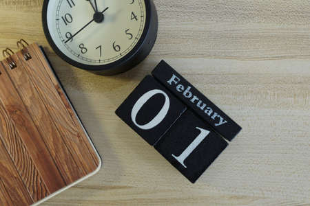 cube calendar on the wooden backgroundの写真素材