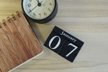 cube calendar on the wooden backgroundの写真素材