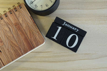cube calendar on the wooden backgroundの写真素材