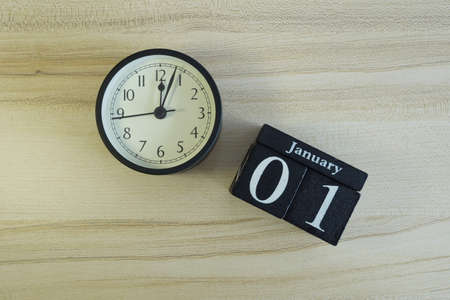 cube calendar on the wooden backgroundの写真素材