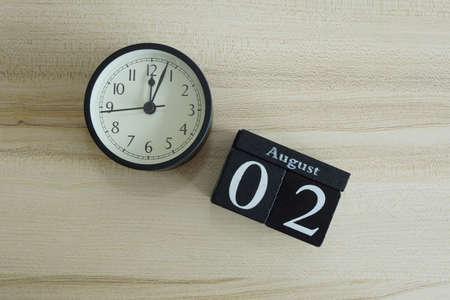 cube calendar on the wooden backgroundの写真素材