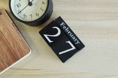 cube calendar on the wooden backgroundの写真素材