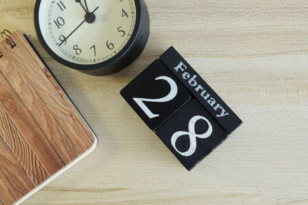 cube calendar on the wooden backgroundの写真素材
