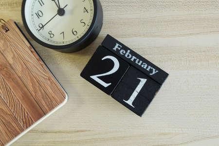 cube calendar on the wooden backgroundの写真素材