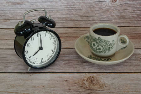 a cup of black coffee on the tableの写真素材