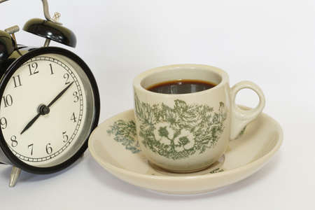 a cup of black coffee on the tableの写真素材