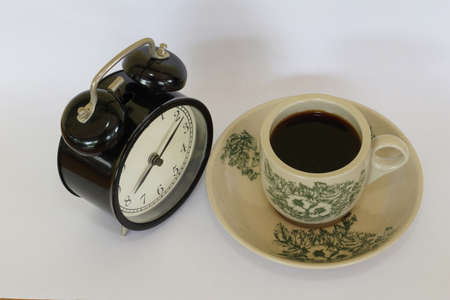 a cup of black coffee on the tableの写真素材