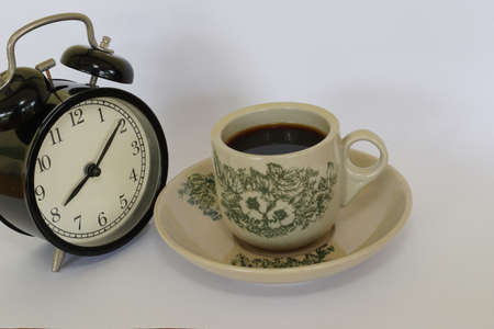a cup of black coffee on the tableの写真素材