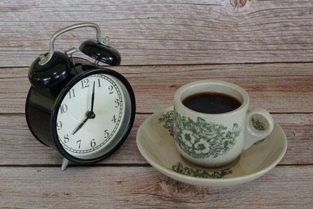 a cup of black coffee on the tableの写真素材