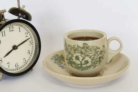 a cup of black coffee on the tableの写真素材