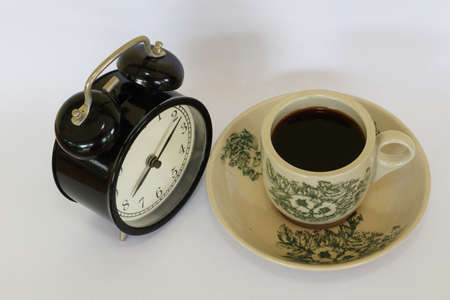 a cup of black coffee on the tableの写真素材