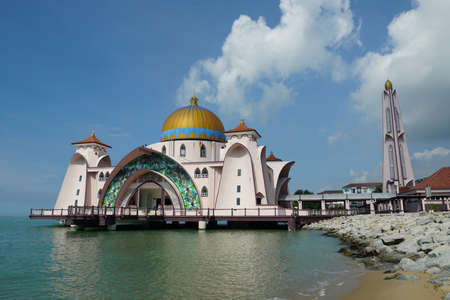 view of Malacca Straits Mosque against blue skyのeditorial素材