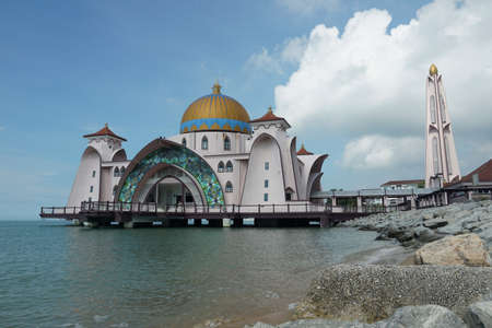 view of Malacca Straits Mosque against blue skyのeditorial素材