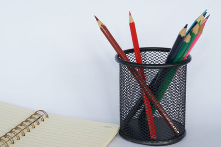 colored pencils against blue background