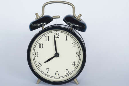 alarm clock on the tableの写真素材
