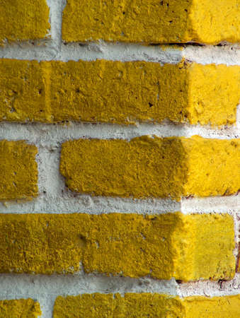 particular of a yellow bricks' wall in Zihuatanejo (Mexico)の写真素材