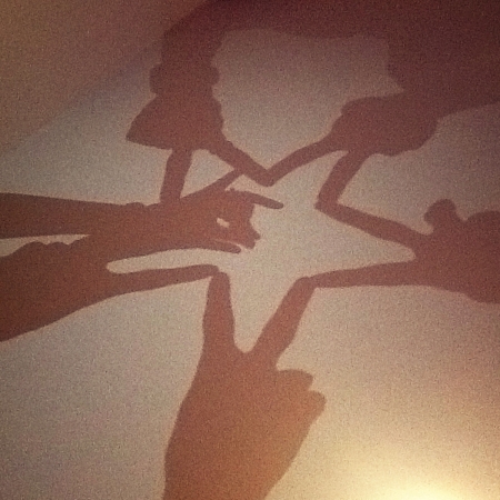 A group of friends doing star shaped trap with a rabbit inside.の素材