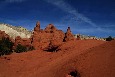 View of the red rock formations in Kodachrome Basin with blue skys and cloudsの写真素材