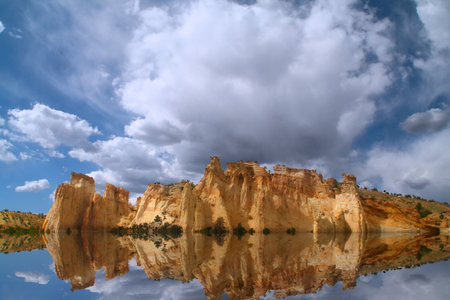  Red rock reflections on the Colorado River with Blue sky’s