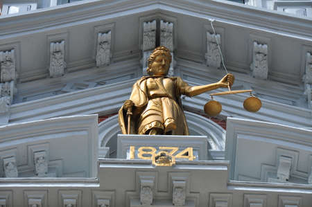 Justice Statue on Courthouseの写真素材