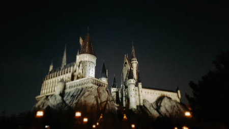 Osaka, Japan on July 8, 2019. A very beautiful light show at night at Hogwarts Castle that you must and must see when you visit Universal Studios Japan. Very tense and interesting.のeditorial素材