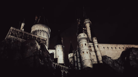 Osaka, Japan on July 8, 2019. A very beautiful light show at night at Hogwarts Castle that you must and must see when you visit Universal Studios Japan. Very tense and interesting.のeditorial素材