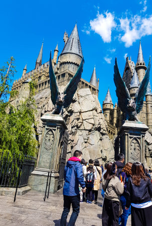 Osaka, Indonesia on April 9, 2019. Tourists are lining up to enter Hogwarts Castle at Universal Studios Japan. One of the must-visit iconic locations in Japan.のeditorial素材