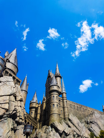 Osaka, Japan on April 8, 2019. This is a photo of the Hogwarts castle building in Universal Studio Japan in Osaka. Hogwarts is a school that functions to train children aged 11 to 18 who have magical abilities.のeditorial素材