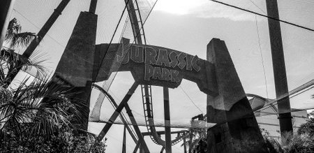 Osaka, Japan on April 9, 2019. Black and white photo of the Jurassic Park ride at Universal Studios Japan. In this area there are several mannequins shaped like dinosaurs.のeditorial素材