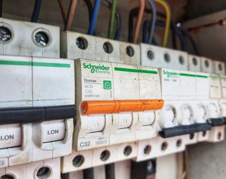 Electrical Panel Box, which contains a Voltage switchboard with circuit breakers. Electrical backgroundのeditorial素材