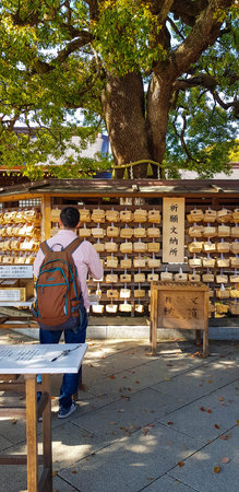 Japan on April 2019. Tourists from Asia, India, America and Europe are visiting Meiji Temple. One of the most famous Shinto shrines in Japan located in Shibuya District, Tokyo.のeditorial素材