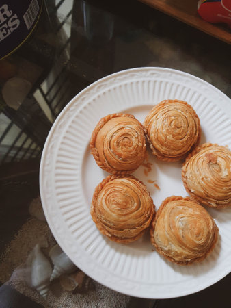 This chicken stuffed pastel with round shape and skin made of pastry is very delicious. The outer skin is very crispy and the filling inside is very dense with chicken and vegetables.の写真素材