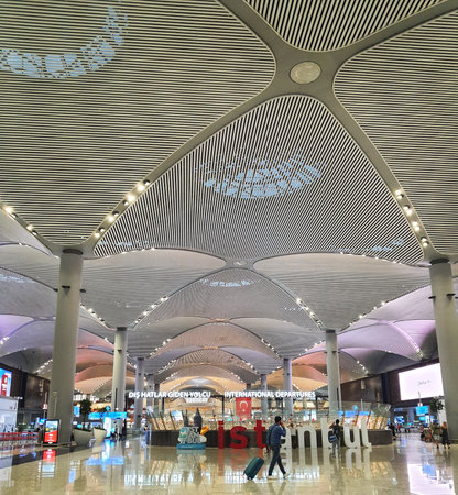 Istanbul, Turkey in July 2022. The condition of a flight departure hall at Istanbul Airport at night, looks quite deserted because the plane lands in the early hours of the morning, where everyone else is still asleep.のeditorial素材