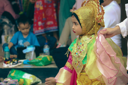 Jakarta, Indonesia in November 2022. Young children ranging from kindergarten to elementary school are taking part in the National Archipelago dance competition. The dances and clothing displayed are typical dances from regions in Indonesia.のeditorial素材
