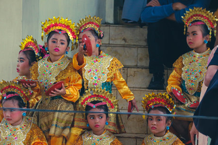 Jakarta, Indonesia in November 2022. Young children ranging from kindergarten to elementary school are taking part in the National Archipelago dance competition. The dances and clothing displayed are typical dances from regions in Indonesia.のeditorial素材