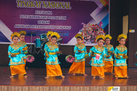 Jakarta, Indonesia in November 2022. Young children ranging from kindergarten to elementary school are taking part in the National Archipelago dance competition. The dances and clothing displayed are typical dances from regions in Indonesia.のeditorial素材