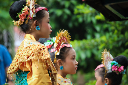 Jakarta, Indonesia in November 2022. Young children ranging from kindergarten to elementary school are taking part in the National Archipelago dance competition. The dances and clothing displayed are typical dances from regions in Indonesia.のeditorial素材