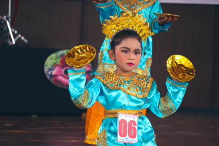Jakarta, Indonesia in November 2022. Young children ranging from kindergarten to elementary school are taking part in the National Archipelago dance competition. The dances and clothing displayed are typical dances from regions in Indonesia.のeditorial素材