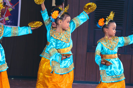 Jakarta, Indonesia in November 2022. Young children ranging from kindergarten to elementary school are taking part in the National Archipelago dance competition. The dances and clothing displayed are typical dances from regions in Indonesia.のeditorial素材
