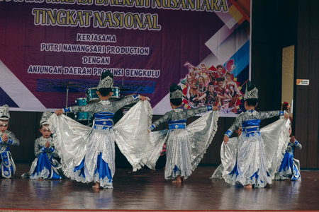 Jakarta, Indonesia in November 2022. Young children ranging from kindergarten to elementary school are taking part in the National Archipelago dance competition. The dances and clothing displayed are typical dances from regions in Indonesia.のeditorial素材