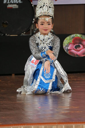 Jakarta, Indonesia in November 2022. Young children ranging from kindergarten to elementary school are taking part in the National Archipelago dance competition. The dances and clothing displayed are typical dances from regions in Indonesia.のeditorial素材